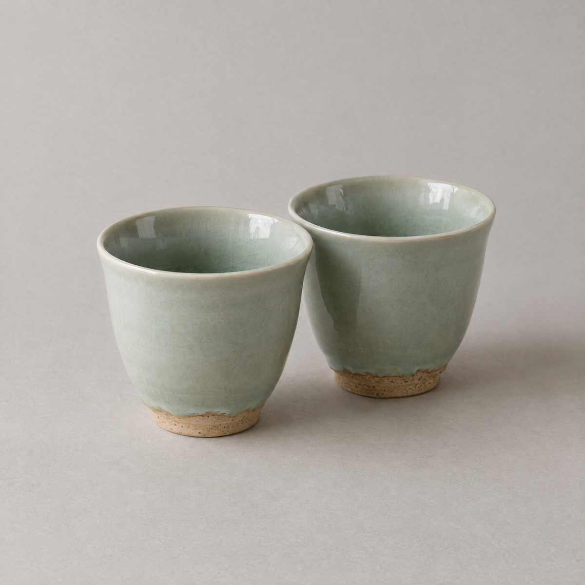 Two Tea Cups in Celadon glaze